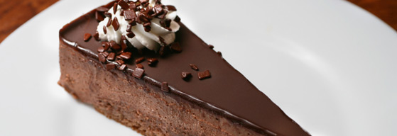 Image of a chocolate mudcake and cream